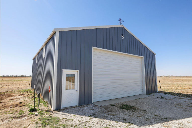 Has 2 horse stalls inside